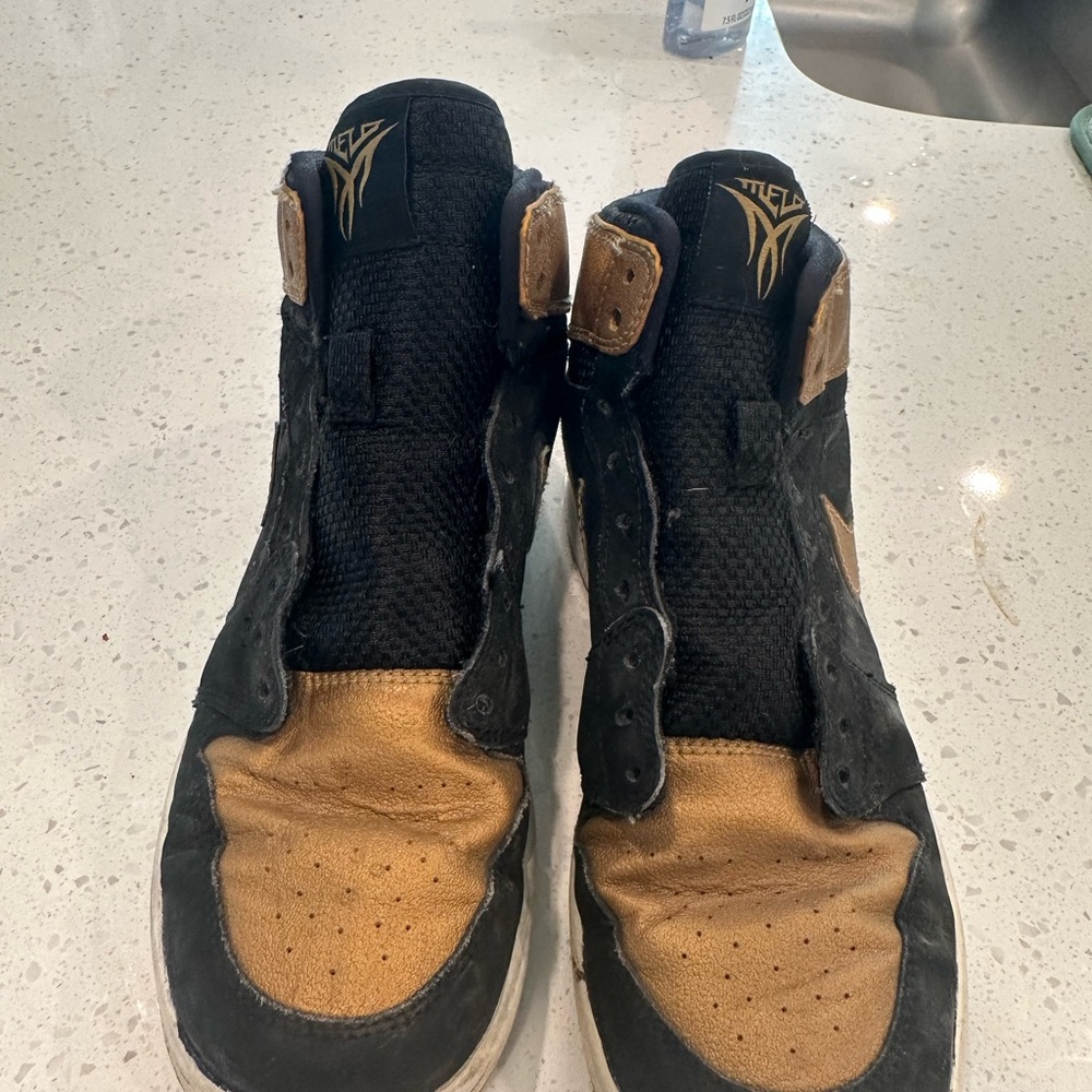 Jordan Black and Gold Athletic Shoes